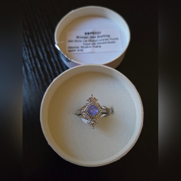 Elegant Silver Ring with Purple Gemstone - Picture 1 of 8
